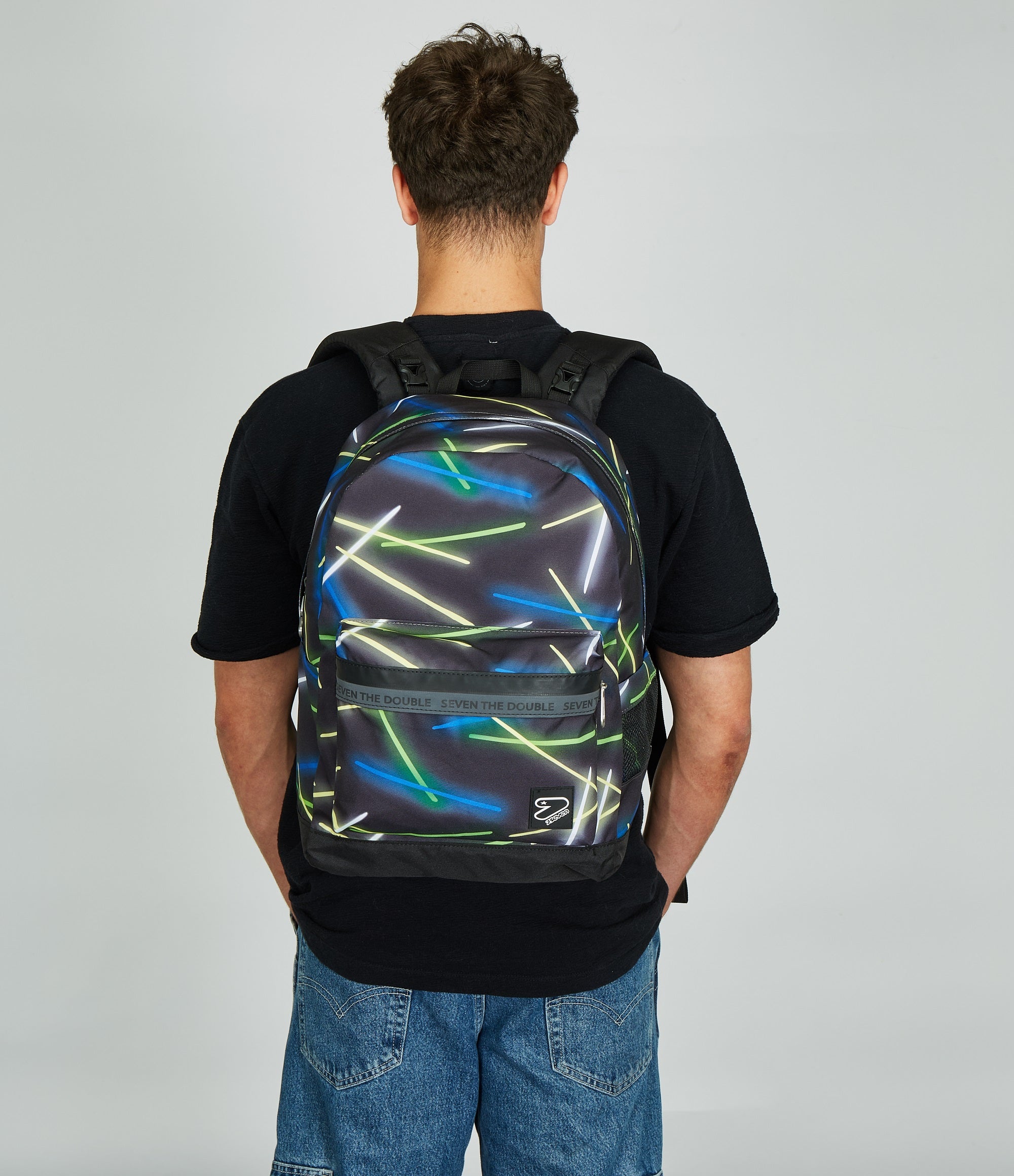 Seven® THE DOUBLE SIDEGLASS REVERSIBLE BACKPACK WITH WIRELESS EARPHO